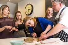 Chef Ben Tunnicliffe gives a fish filleting demonstration to the Cornish Gems team to showcase the new private dining experience offering
