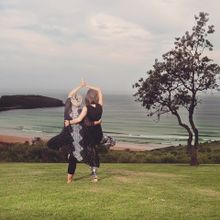 Shontelle Hannigan and Susan Lozenkovski enjoying a tree pose at Reflections Killalea Reserve