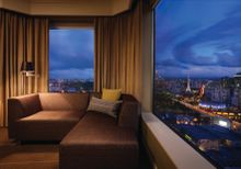 Rooms offer views overlooking the city's skyline