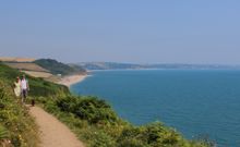 Walking the South West Coast Path, with views over the Start Bay coastline