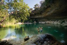 Jumping into Hamilton Pool