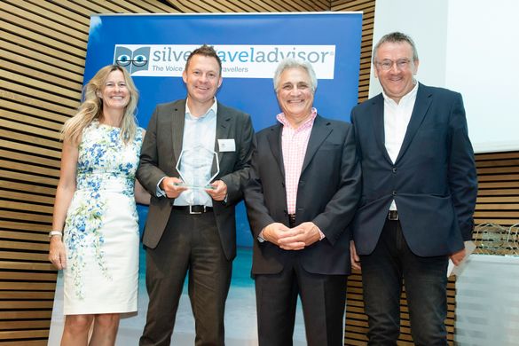 Keith Norman, Affinity Sales Manager at Fred. Olsen Cruise Lines (second from left) receives the ‘Best Ocean Cruise Line’ award from Classic FM presenter John Suchet (second from right), Debbie Marshall, Managing Director of Silver Travel Advisor (far lef