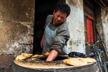 Baked roll master, Jiangsu, China. Zhu Jingyi/tpoty.com