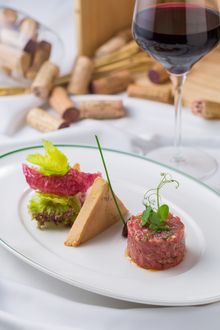  French beef tartar with foie gras terrine, mixed salad with walnut dressing.
