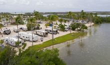 This aerial photo shows recreational vehicles parked Monday, Sept. 10, 2018, at Sunshine Key RV Resort near Big Pine Key, Fla., in the Florida Keys. The 75-acre, 399-site property was pummeled by Hurricane Irma on Sept. 10, 2017. A year later it formally 