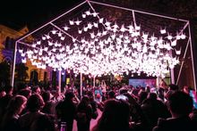 Crowds enjoying the 1000 Cranes light installation on George Street, The Rocks during Vivid Sydney 2018
