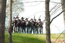 Reenactors prepare for the Battle of Riggins Hill