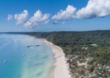 The western bay of K'gari, home to Kingfisher Bay Resort