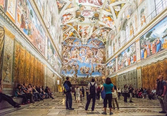 Admiring the ceiling of the Sistine Chapel in the Vatican, Italy 