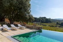 The infinity pool has amazing views over the Tuscan hills