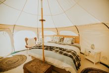 Enjoy a night glamping in a private luxurious lotus belle ‘tent’