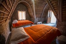Inside a traditional Jukil community guest house in rural Bolivia with G Adventures