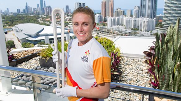 Gold Coast 2018 Commonwealth Games ambassador and former world champion sprint hurdler Sally Pearson with the GC2018 Queen's Baton.