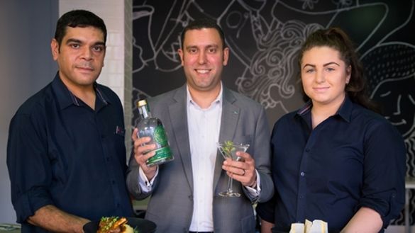 Jeremy Samuels, General Manager ibis Adelaide (centre) with James Stanley & Georgia Day presenting their 2017 National Reconciliation Week & NAIDOC week menu specials:  Braised Wallaby Shanks, Green Ant Gin & Desert Lime Martini & Saltbush Pavlova