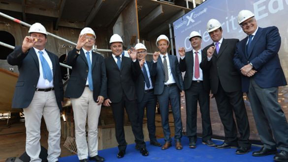 Photographed from left to right: Xavier Leclercq, SVP, Newbuild & Innovation, Royal Caribbean Cruises, Ltd.; Laurent Castaing, General Manager, STX France; Costas Nestoroudis, Captain of Celebrity Edge; Jean-Yves Jaouen, Operations Senior Vice President, 