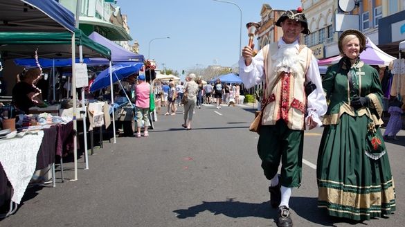 Town crier Ken Ashford and Carmel Murdoch dressed as Mary Heritage at the Maryborough Markets.