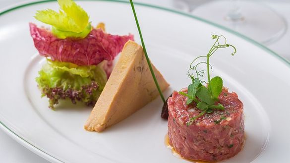 French beef tartar with foie gras terrine, mixed salad with walnut dressing. French beef tartar with foie gras terrine, mixed salad with walnut dressing.