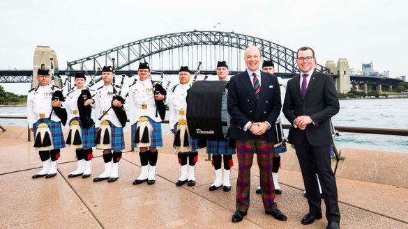 L-R: Royal Edinburgh Military Tattoo pipers and drummers with the Producer and CEO Royal Edinburgh Military Tattoo, Brigadier David Allfrey, MBE; and Minister for Tourism and Major Events, Adam Marshall MP