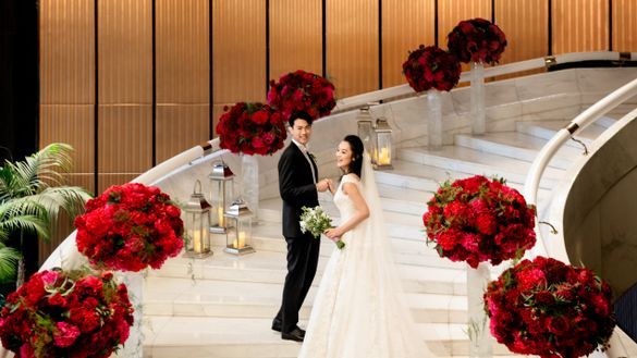 Bride & Groom on White Marble Staircase