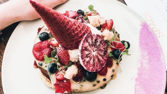 The image of 'The unicorn waffle' from Space Kitchen that graces the cover of Canberra's Events Guide for summer.