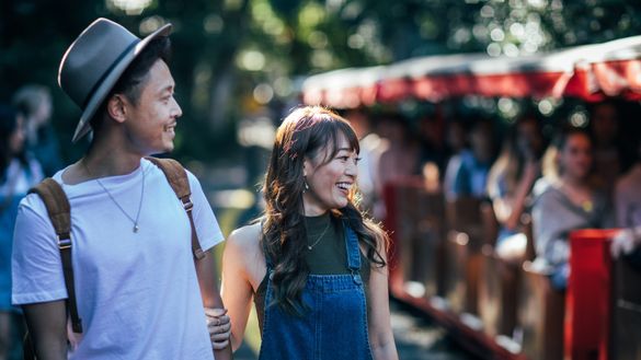 Japanese Couple Watching Train