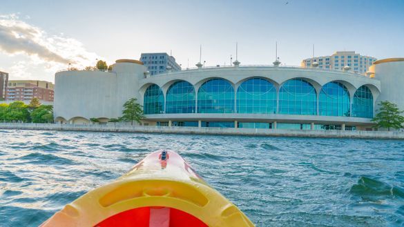 Enjoy an iconic lake adventure by kayaking in front of the Frank Lloyd Wright-designed Monona Terrace.