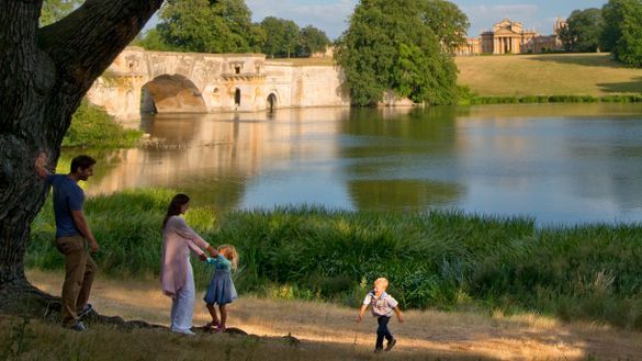 Family playing in the park at Blenheim Palace Family playing in the park at Blenheim Palace