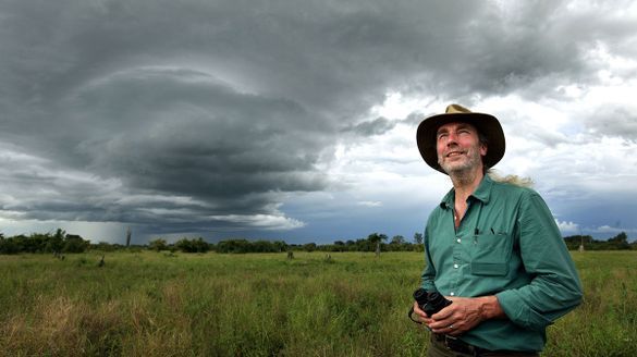 Simon standing in the Luangwa Valley in Zambia. Photograph: David Bebber.