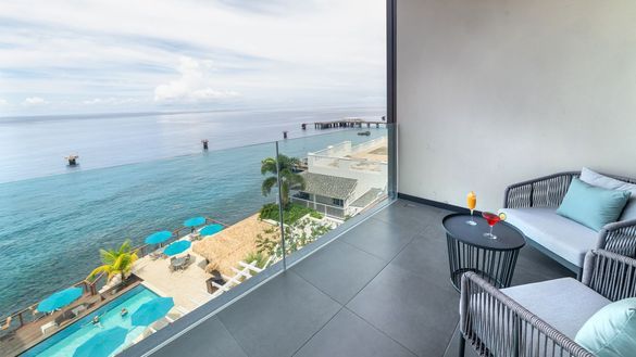 The view from one of the new Fort Ocean View rooms. The balconies overlook the clear Caribbean Sea The view from one of the new Fort Ocean View rooms. The balconies overlook the clear Caribbean Sea