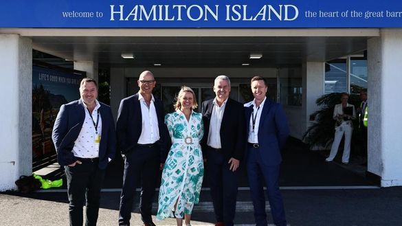 Queensland Tourism Minister Andrew Powell, North Queensland Airports chief executive Richard Barker, assistant tourism minister Bree James, East air owner Alan Milne and Hamilton Island chief executive Nick Dowling celebrate the launch of the new service 