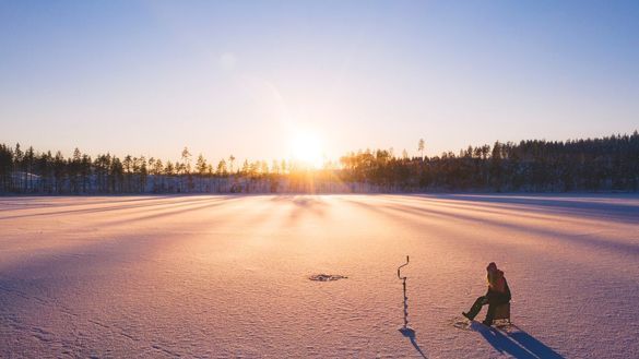 Ice fishing in Dalarna, Sweden. Photo: Roger Borgelid/Visit Sweden
