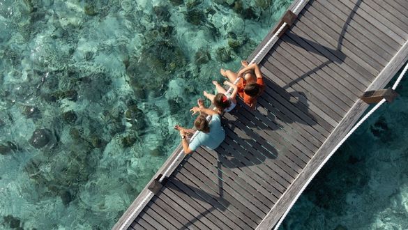 Sheraton Maldives Full Moon Resort & Spa - Family on Overwater Bridge