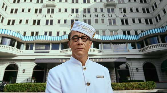 Felix, The Peninsula's forever-dapper concierge, page, and driver, stands before The Peninsula Hong Kong's iconic façade, looks straight into the lens, and offers his heartfelt truth: “After all, there is no greater luxury than time.”